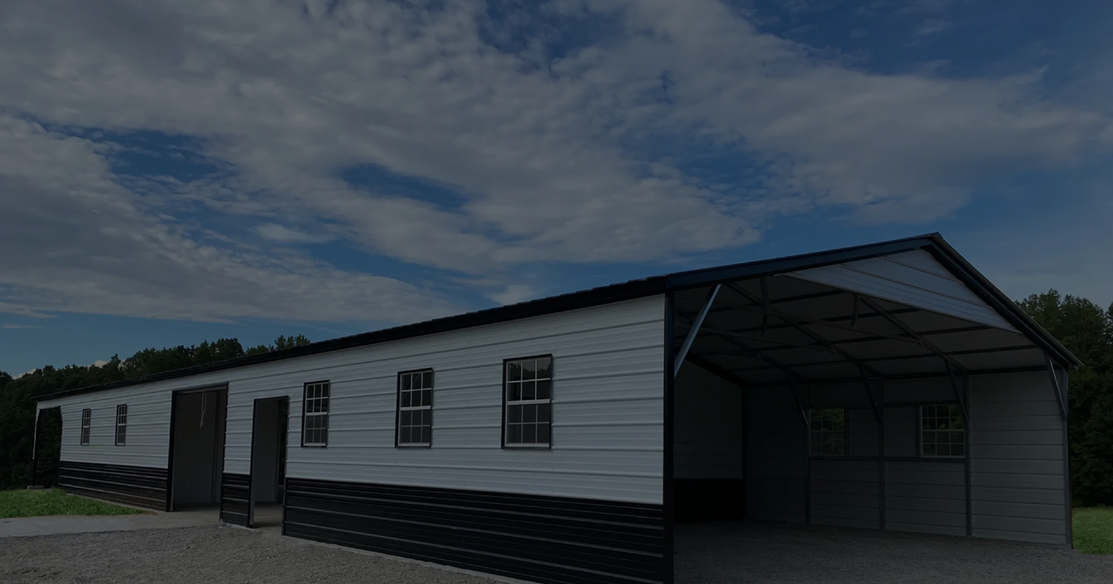 Steel buildings and carports on a residential property